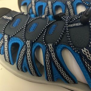 NEVER WORN!!  Men’s size 11 Dream Pairs Water Sandals in Navy Blue